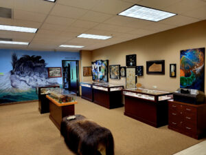 A wider view of the NPUC Creation Study Center in Ridgefield, WA. In the back you see the Mt Saint Helens Mural and to its right on the wall is the "Seven Days of Creation" artwork, and on the extreme right is the "In the Beginning" painting.