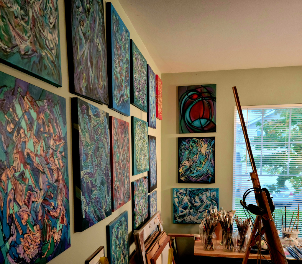 About half of the "Out of Your Mind" series is seen on the wall. This is during the time the north window studio was being used. The idea of that series is that the interpretation of the art would come out of your mind, but I suspect that some who saw the artwork may have thought the artist himself was out of his mind! Not everybody sees what everybody else does... thank God! Photo taken September 2021